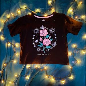 crop top that says “one of a kind”